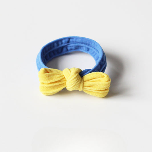 Adorable bow-tie hair tie for women, a popular net-famous hair accessory with a simple style.