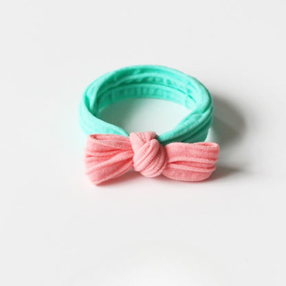 Adorable bow-tie hair tie for women, a popular net-famous hair accessory with a simple style.