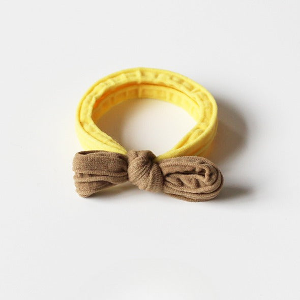 Adorable bow-tie hair tie for women, a popular net-famous hair accessory with a simple style.