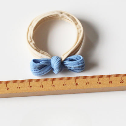 Adorable bow-tie hair tie for women, a popular net-famous hair accessory with a simple style.