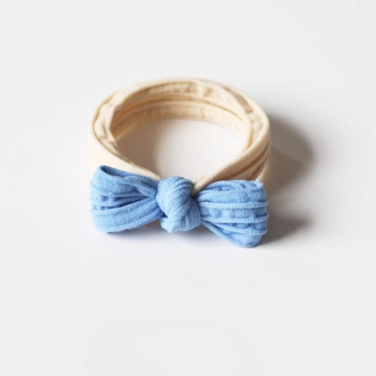 Adorable bow-tie hair tie for women, a popular net-famous hair accessory with a simple style.