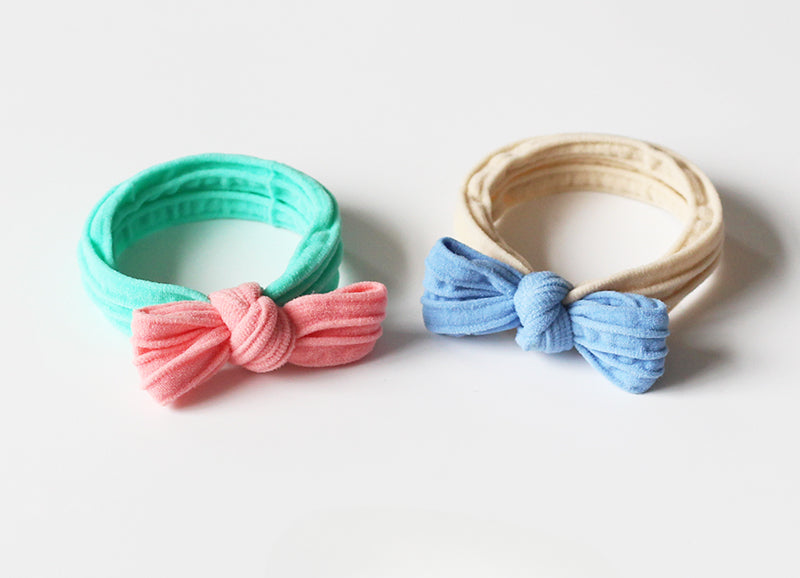 Adorable bow-tie hair tie for women, a popular net-famous hair accessory with a simple style.