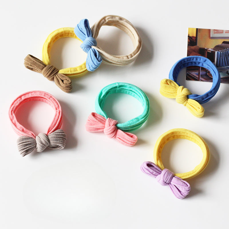 Adorable bow-tie hair tie for women, a popular net-famous hair accessory with a simple style.