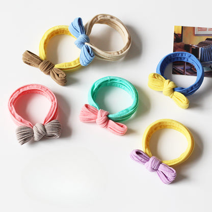 Adorable bow-tie hair tie for women, a popular net-famous hair accessory with a simple style.