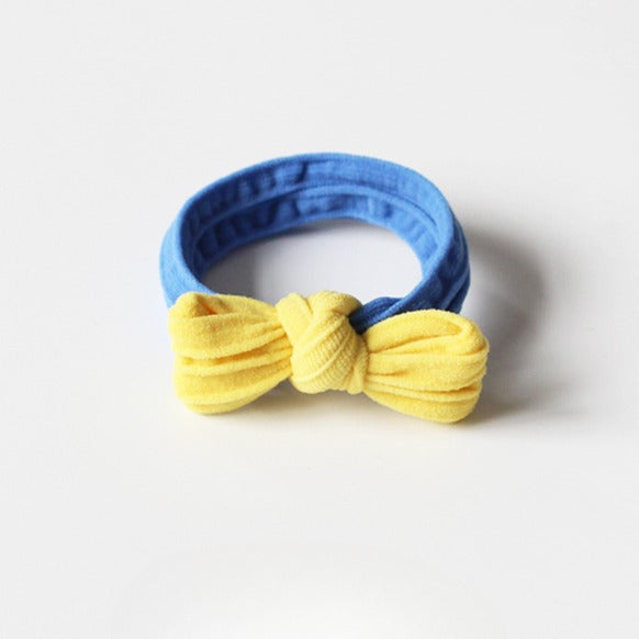 Adorable bow-tie hair tie for women, a popular net-famous hair accessory with a simple style.