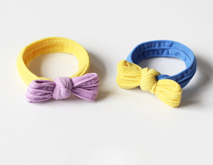Adorable bow-tie hair tie for women, a popular net-famous hair accessory with a simple style.