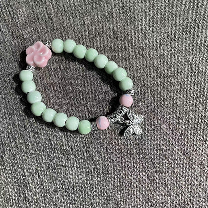 Porcelain Bead Butterfly Bracelet for Women - An Ethnic-style Handmade Pentagram Accessory, Featuring a Unique and Fashionable Flair.