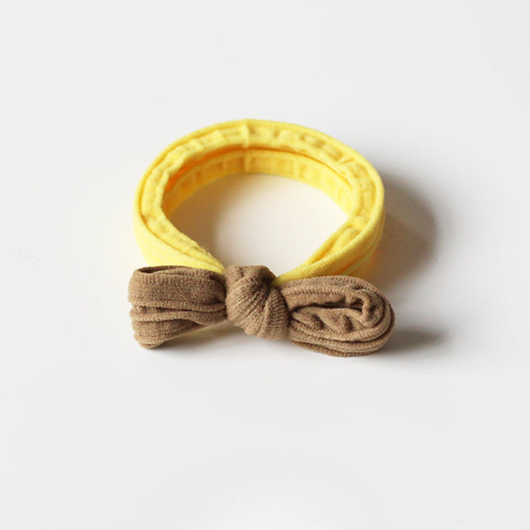 Adorable bow-tie hair tie for women, a popular net-famous hair accessory with a simple style.