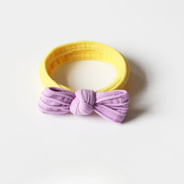 Adorable bow-tie hair tie for women, a popular net-famous hair accessory with a simple style.