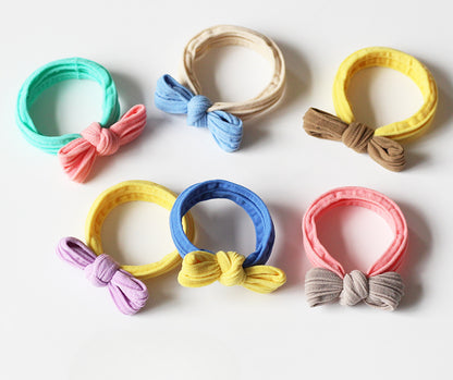 Adorable bow-tie hair tie for women, a popular net-famous hair accessory with a simple style.