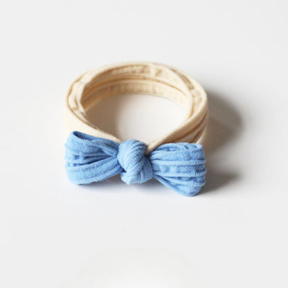 Adorable bow-tie hair tie for women, a popular net-famous hair accessory with a simple style.